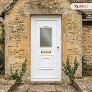 Victorian Georgian Bar UPVC door with decorative glass panel and classic white finish