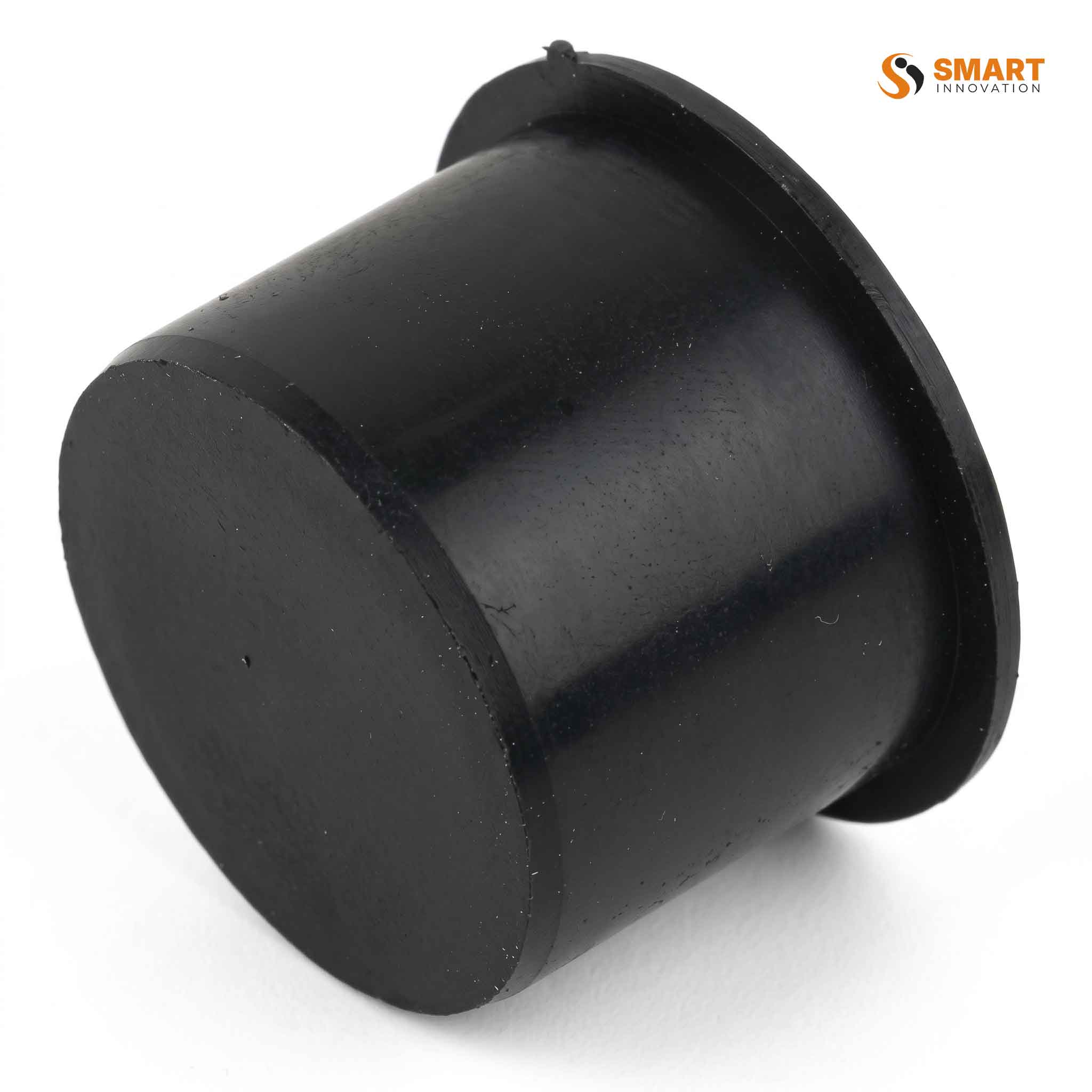 Black plastic SP32B push-fit waste pipe socket plug blanking cap on a white background.