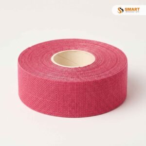 pink self adhesive scrim tape applied over a plasterboard joint
