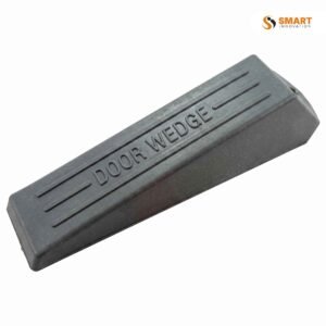 A Rubber Door Wedge holding a door open, gripping the floor securely without causing damage.