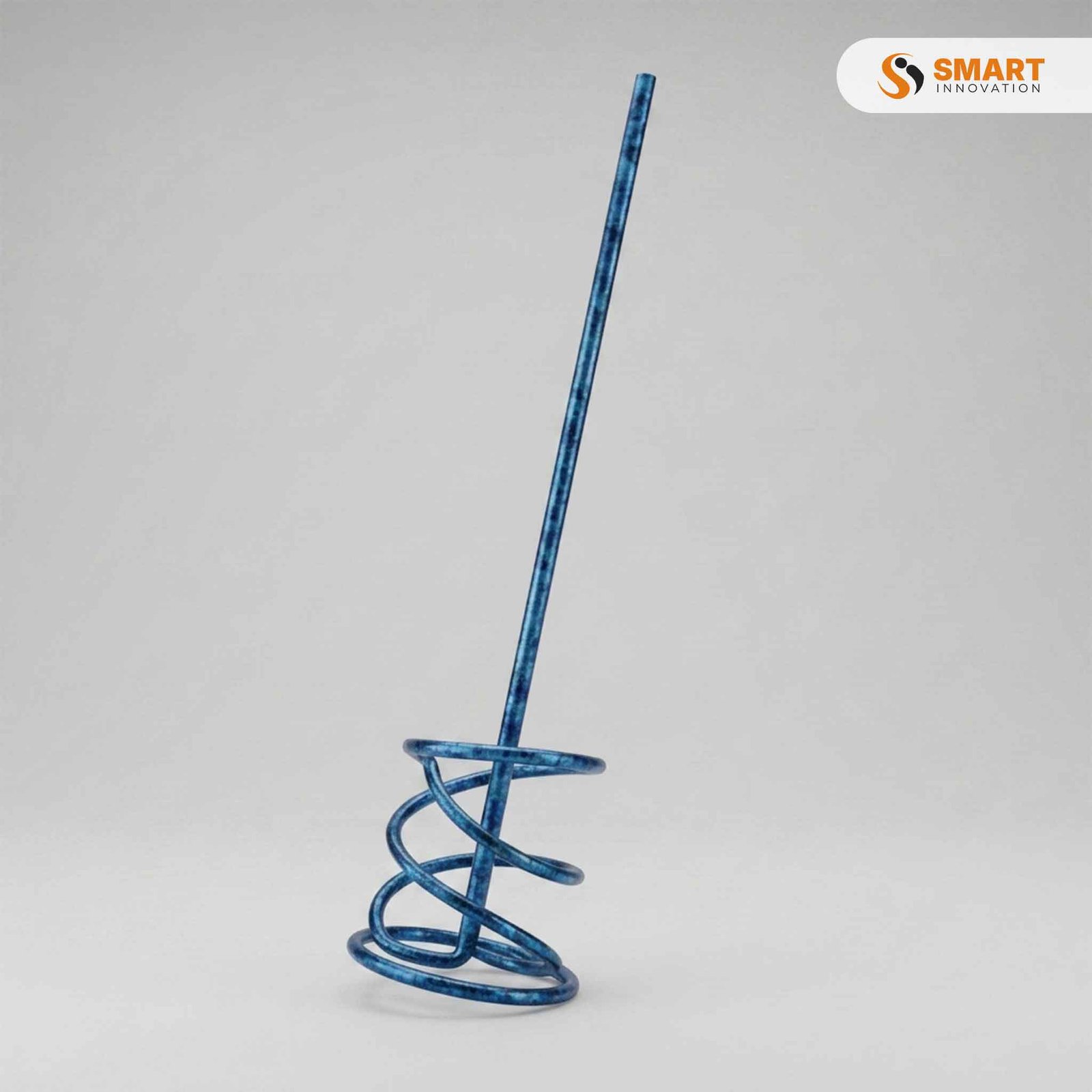A Paint Mixer fitted to an electric drill, mixing paint, plaster or adhesive to a smooth, lump-free consistency.