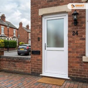 White UPVC half panel back door with frosted double-glazed glass installed on a brick house