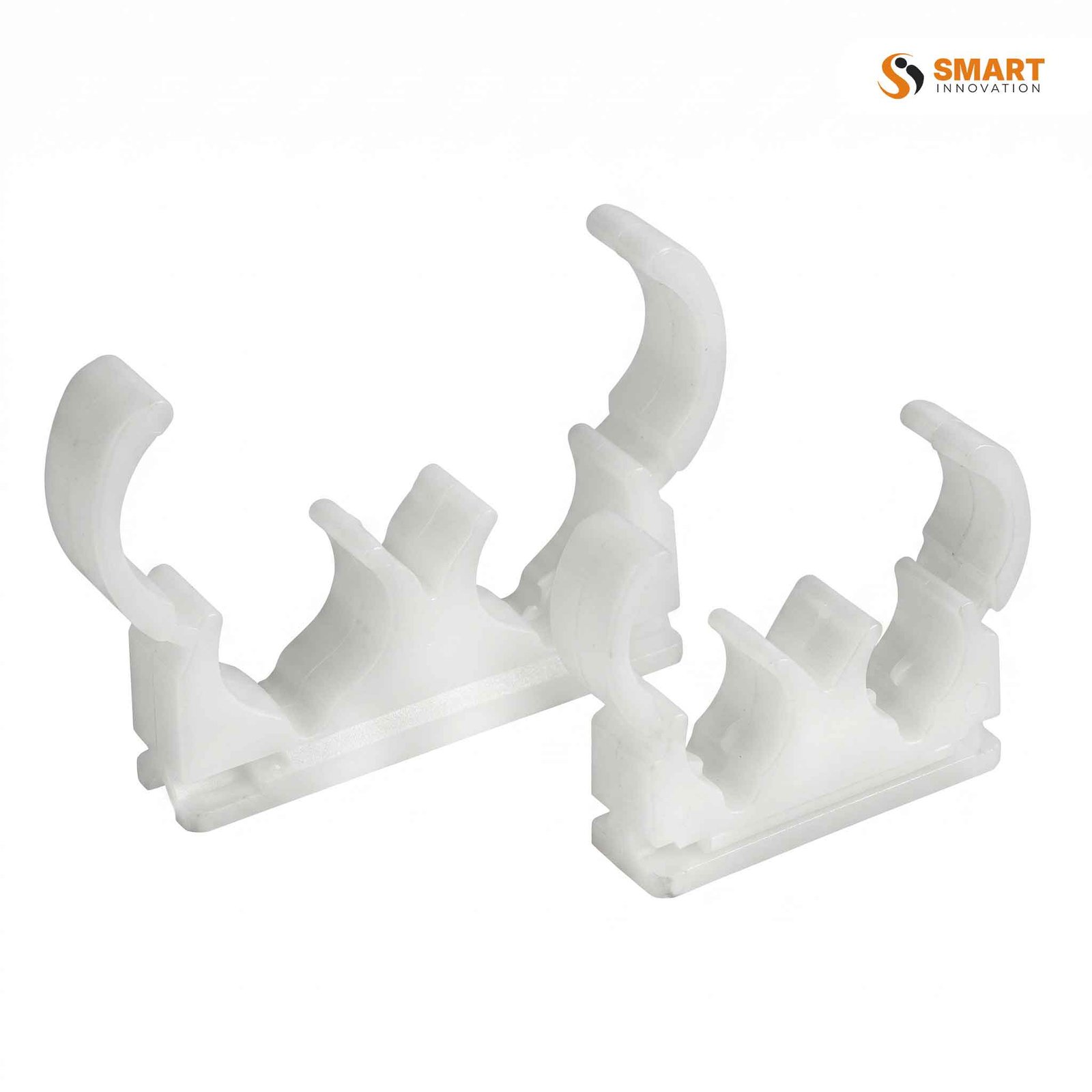PVC hinged double clip for securely fixing two parallel pipes or conduits.