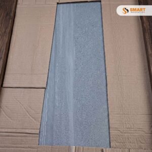 Bein Sirli Porcelain Light Grey 30x60 tiles installed seamlessly on a contemporary bathroom floor and wall crossover