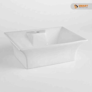 Nuie white rectangular counter top basin with square waste in a bathroom setting