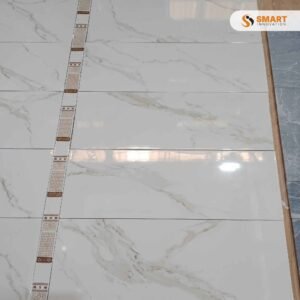 Emotion Naos gold brillo tile installed on a luxury bathroom feature wall