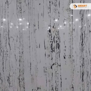 Calacatta Ink large format tiles on living room floor and feature wall