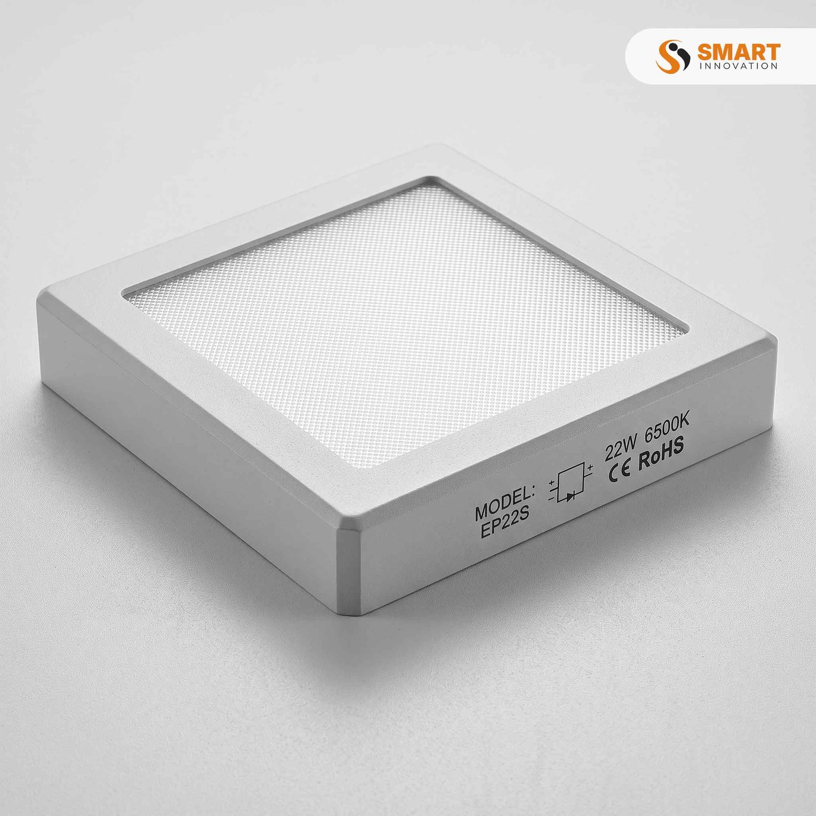 Square LED surface panel light, 6500K daylight white, mounted directly onto a ceiling for bright modern lighting.