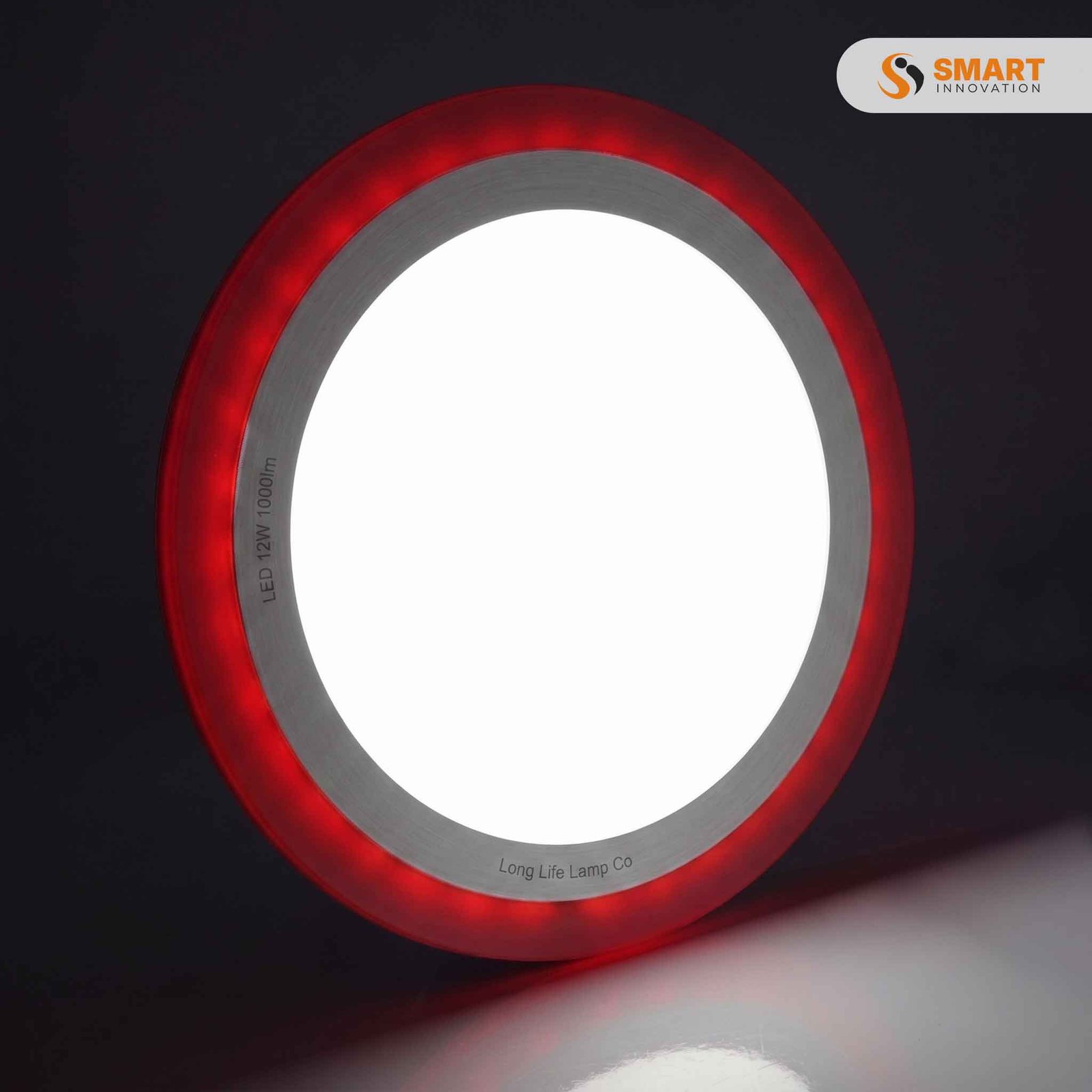 LED recessed panel light with red and white illumination, fitted into a ceiling for decorative modern lighting.