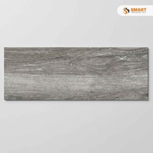 Sandalo Gris 23,5x66,2 tile laid across a modern living room floor