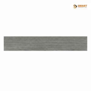 Times Antracita 15x90 plank tile installed across a modern living room floor
