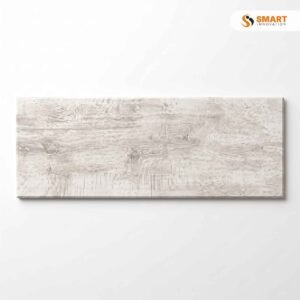 Wild Blanco 24x88 wood effect plank tiles installed on a bright modern open-plan kitchen floor