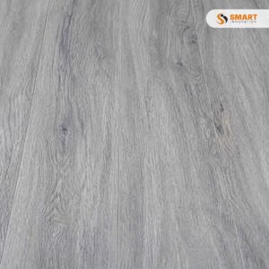 8mm Light Grey Spc Flooring rigid core planks fitted continuously across a bright, Scandinavian-style open-plan living room