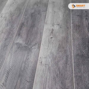8mm Spc Grey Flooring heavy-duty rigid planks fitted throughout a spacious, ultra-modern open-plan lounge layout