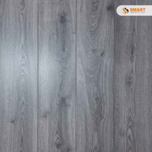 Laminate Millnum Oak Grey 7MM floorboards installed across a minimalist urban studio apartment floor layout