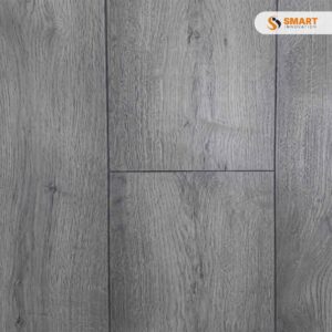 Laminate Dartmoor Oak 12mm premium floorboards installed across a spacious, traditional country-style living room area