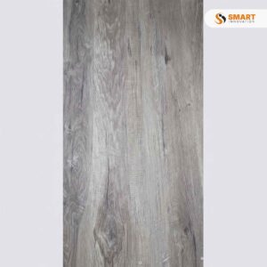Spc Grey Waterproof flooring planks installed continuously across a high-end contemporary kitchen and dining space