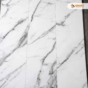 Super White Marble tiles installed as a luxury splashback and matching floor in an upscale kitchen space